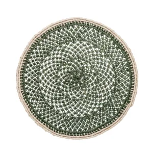 Round green and cream crocheted circular placemat or coaster