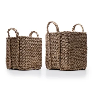 Three woven seagrass storage baskets with handles