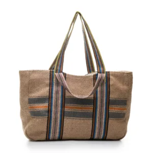 Beige textured tote bag with striped handles and accents