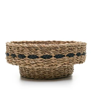 Woven straw basket with black decorative band trim