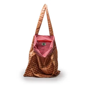 Brown plaid shoulder bag with red gingham pocket detail